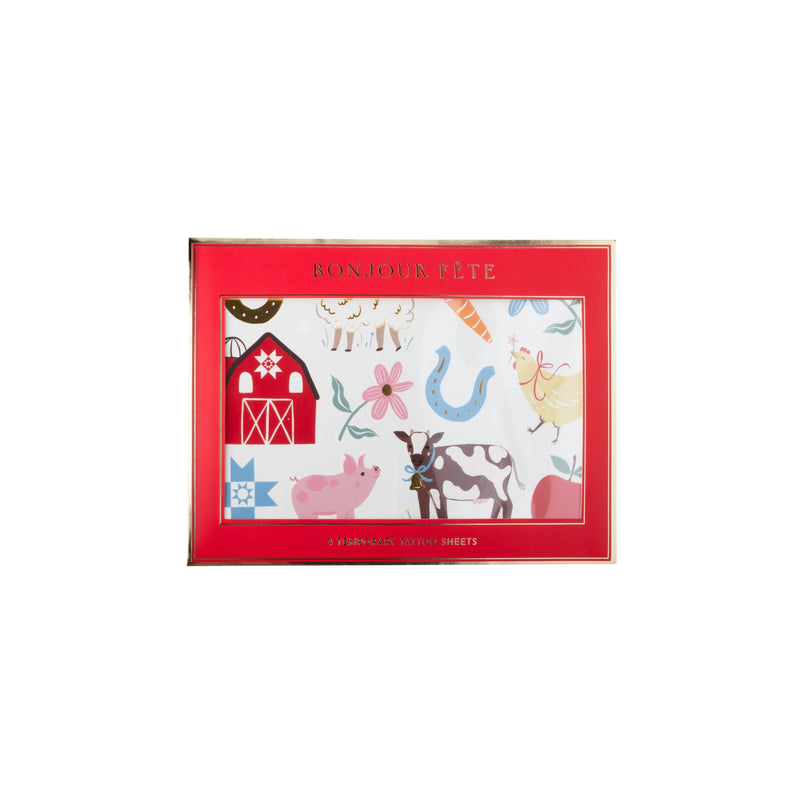 Countryside farm animal temporary tattoos shown in red packaging with a cow, pig, and red barn