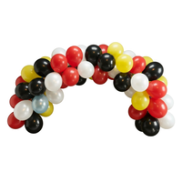 firetruck themed balloon garland in red yellow black and white
