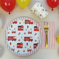 Firetruck plate with balloons and party decor.