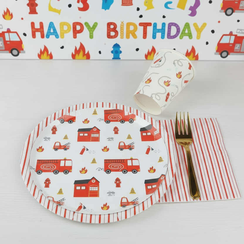 Firetruck dessert plates with striped napkin and fork.