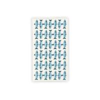 Cream paper guest towel with an all-over hand-drawn blue spotted-trout print, shown flat on a white background