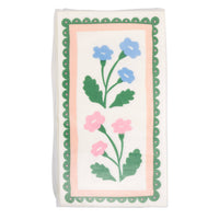 Packaged floral border dinner napkins showing full design