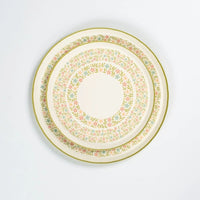 floral meadow dinner plates stacked showing sage rim and pastel flowers.