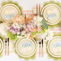 floral paper plates large with baby shower table setup.
