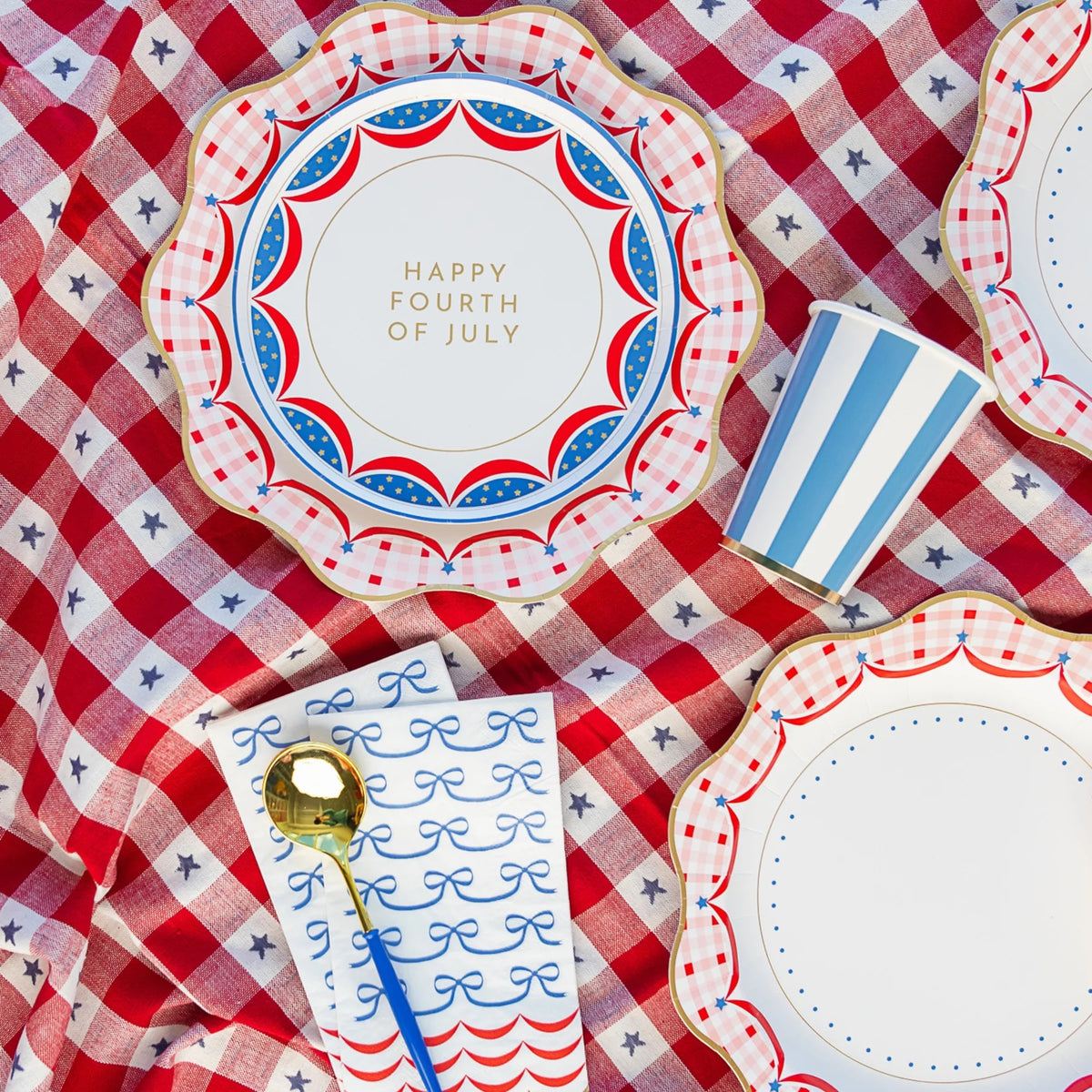 Red Gingham 4th of July Dinner Plates paired with matching napkins and cups for a patriotic tablescape.