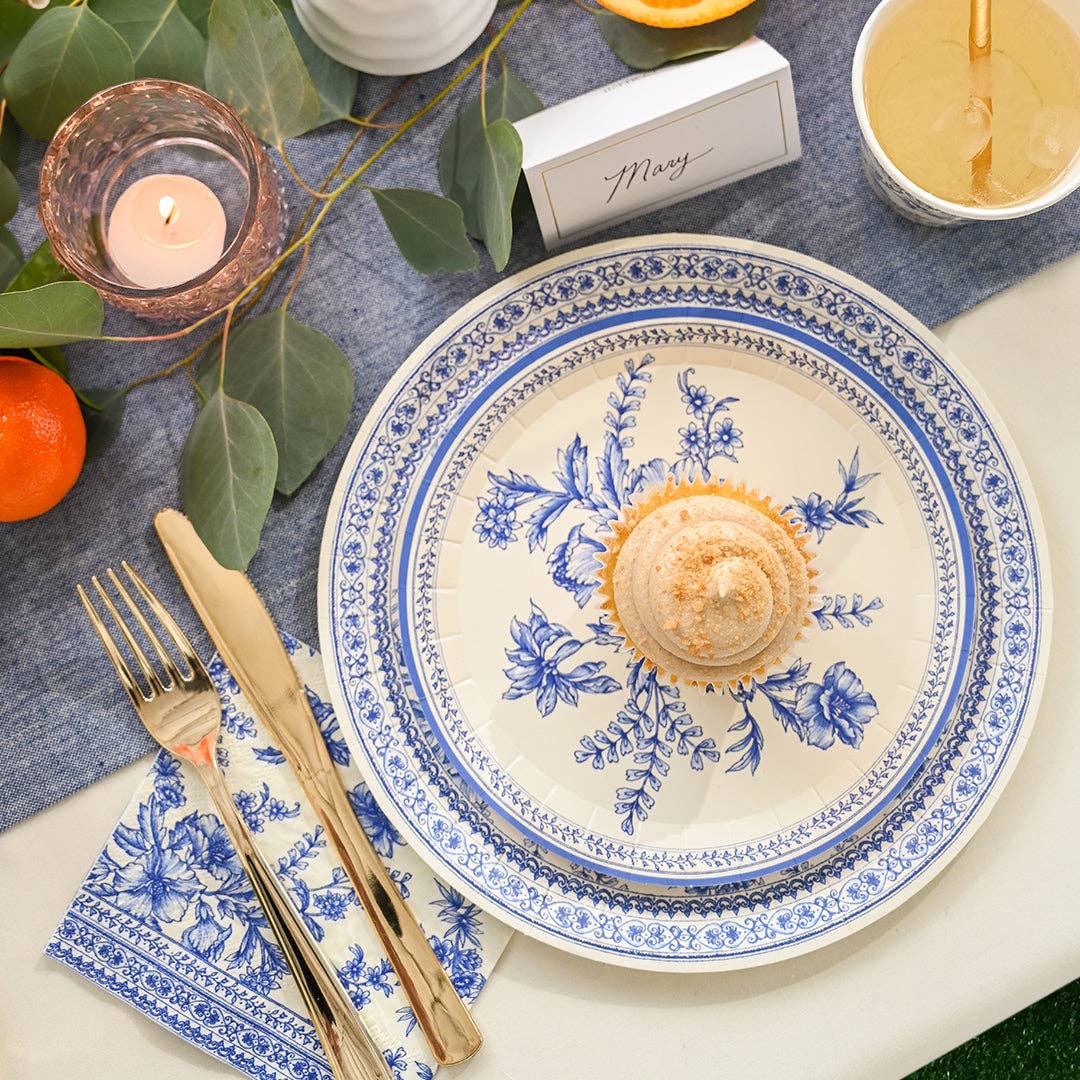 French toile dessert plate with pastry and gold cutlery