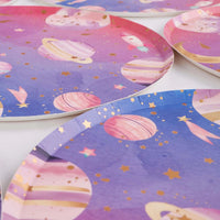 close up of galaxy plate with planets and star pattern