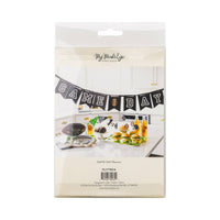 Back view of Game Day ribbon banner packaging with banner displayed in party setting