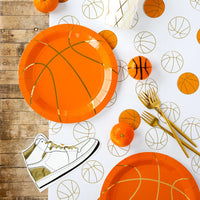 Game-day spread with basketball plates and sneaker paper napkins.
