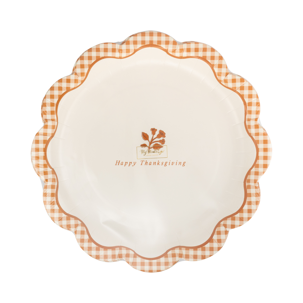 Close up detail showing glossy gold foil text and scalloped edge on rust checkered paper plate.