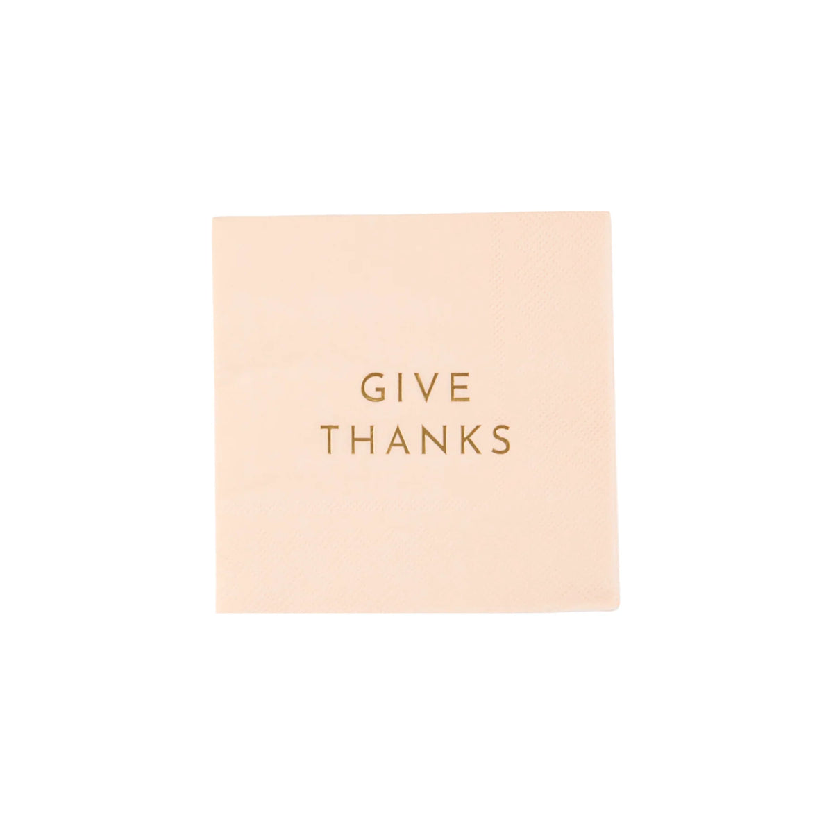 Single peach cocktail napkin with gold “GIVE THANKS” text, front view.