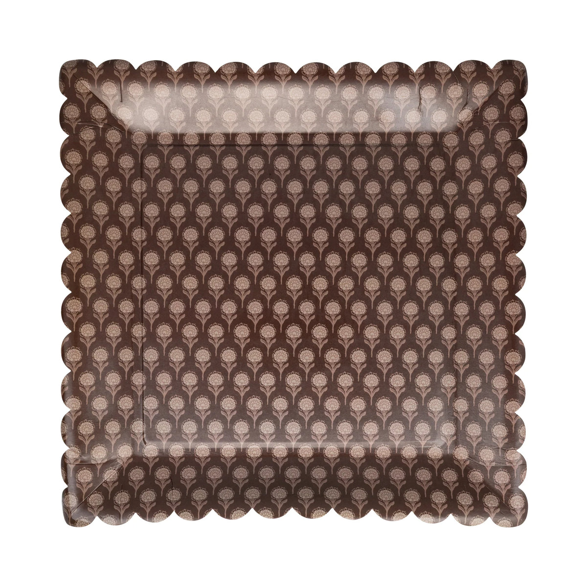 Close-up of brown plate with repeating floral motif and scalloped rim.