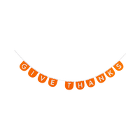Orange scalloped felt banner spelling Give Thanks with cream letters against a clean white background.