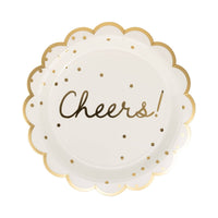 Single round cream paper dinner plate with gold foil Cheers script scattered gold dots and gold foil wavy scalloped border on white background