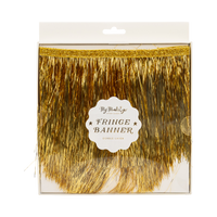Packaging front for the gold fringe banner showing the folded fringe and a "Fringe Banner" label.