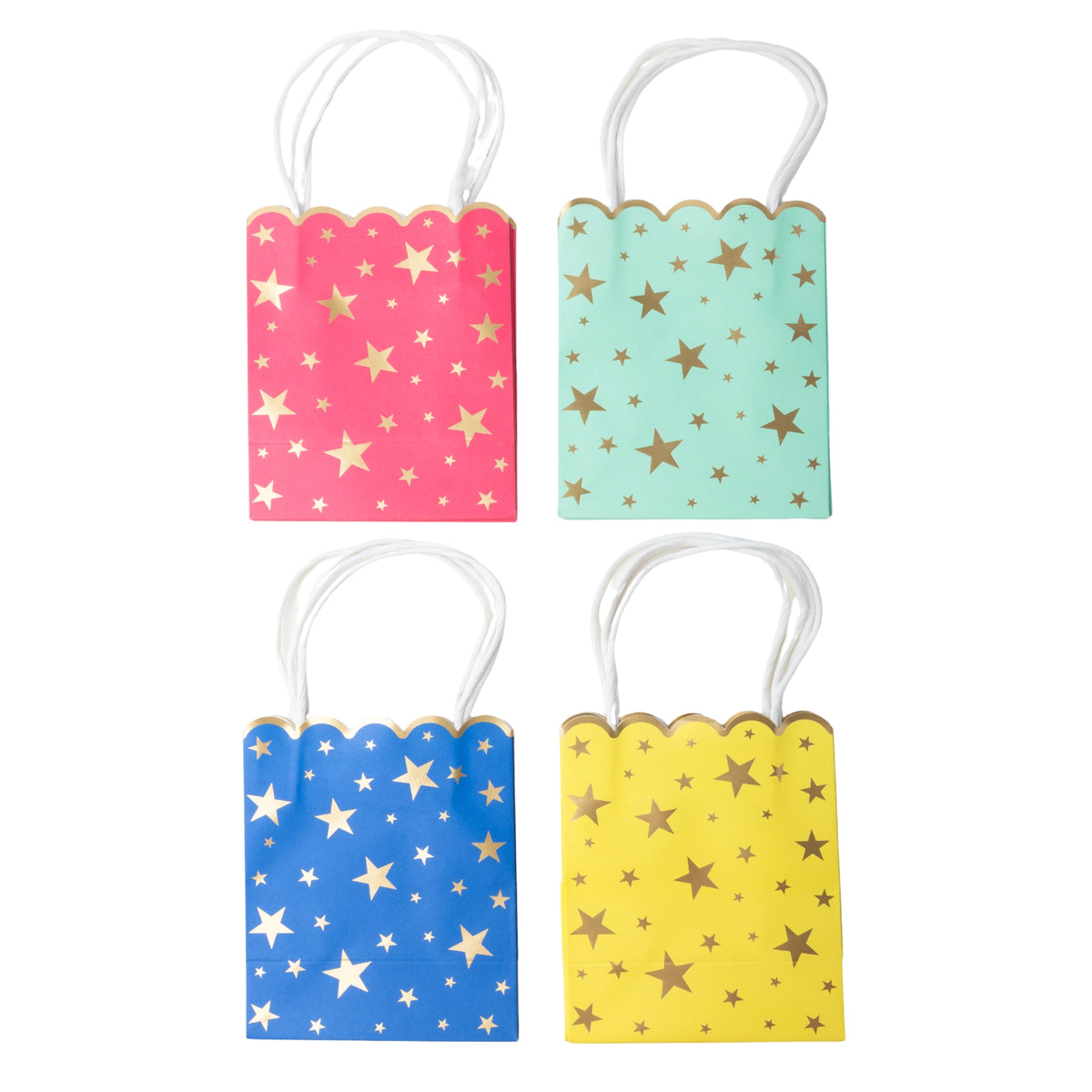 Four star-print favor bags — pink, mint, blue, and yellow — in a grid, each with gold-foil stars, a scalloped top, and white twisted-paper handles.