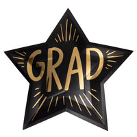 Black star-shaped graduation plate with gold GRAD lettering and starburst accents