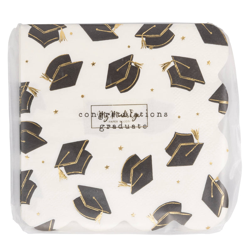 Packaged graduation cocktail napkins showing black mortarboard pattern and gold foil details
