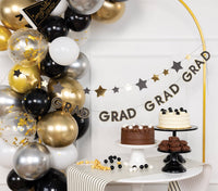 A two-strand banner stack used as a dessert bar backdrop for a Class of 2026 table decor display.