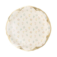 A stack of 8 scalloped paper plates with gold foil and a Poetcore floral design, ready for an Easter celebration.