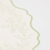green floral placemat detail close up.