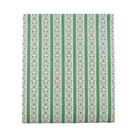 Unrolled green and cream floral stripe paper table runner on a white background