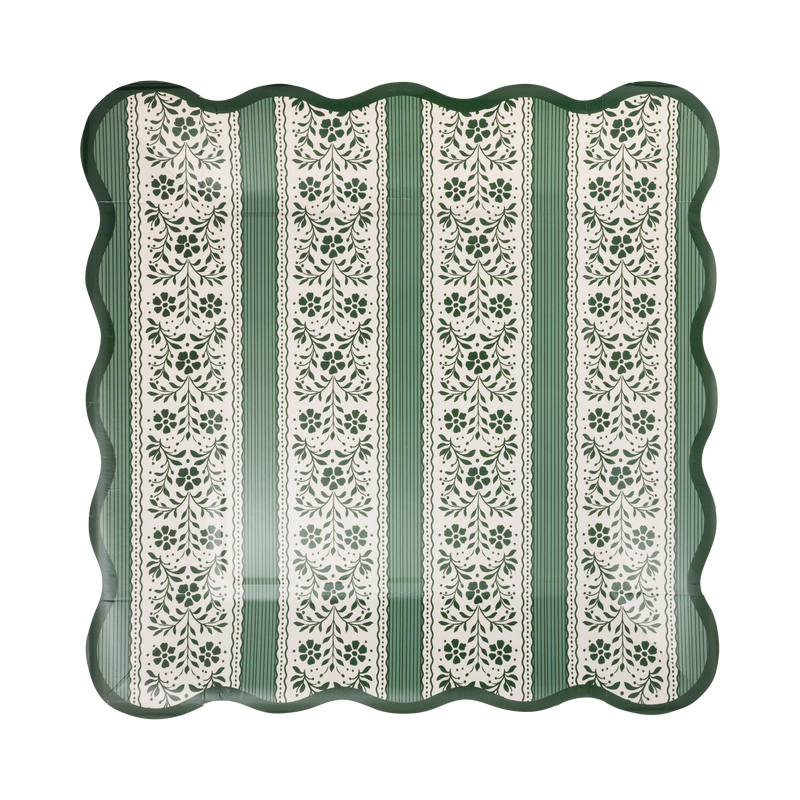 Square green and cream floral stripe paper plate with a wavy green scalloped edge on a white background