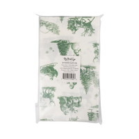 Back of a pack of 24 green toile Santa paper dinner napkins in clear packaging