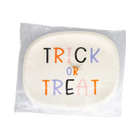 Front of sealed eight-pack word-bubble plates showing colorful “TRICK OR TREAT” design through clear wrapper—ready for retail display.