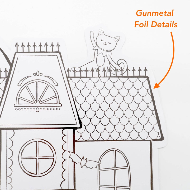 Close up detail showing the gunmetal foil outlines on the scalloped roof of the haunted house paper placemat.