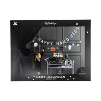 Front of the Halloween banner set packaging — black box with white stars, showing the banner and "Happy Halloween Character Banner Set" label.