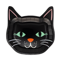 Black cat-shaped paper plate with green eyes, white whiskers, and an orange nose on a white background.