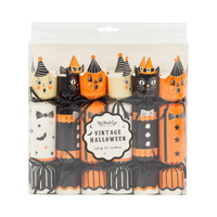 Packaged Halloween-themed crackers with black, orange, and white design on a clear front packaging.