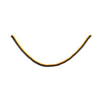 Orange, black and cream crepe paper Halloween garland swagged against a white background