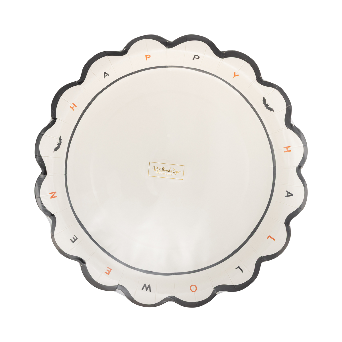 Angled overhead view of the cream Halloween dinner plate showing the spaced black and orange rim lettering, bat details, and My Mind's Eye logo in the center.