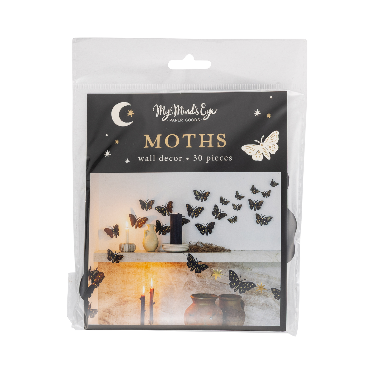 Halloween moth wall decor packaging — clear bag with "MOTHS" header card showing black gold-foil moths inside.
