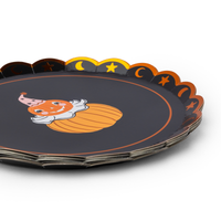 Angled stack of Halloween party animal plates showing the scalloped foil edge with stars and moons