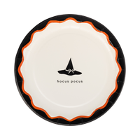 Cream Halloween plate with a black witch hat icon and "hocus pocus" text, black rim and orange scalloped edge.