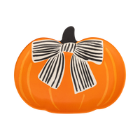 Halloween pumpkin bamboo serving plates with orange, black, and cream bow design on a white background.