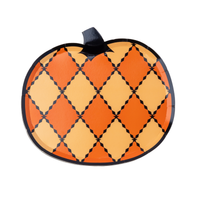 Orange harlequin pumpkin shaped paper plate with a black stem and black diamond argyle lines