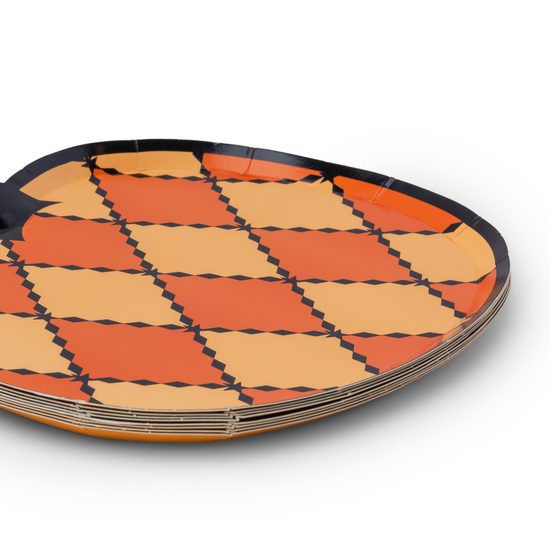 Stack of 8 die-cut harlequin pumpkin paper plates showing the black rim and pumpkin shape
