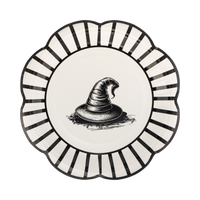 A top view of the halloween themed paper plates showing the scalloped edges.