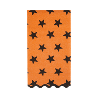 Orange Halloween paper guest towel with black stars and a black scalloped edge, shown folded on white