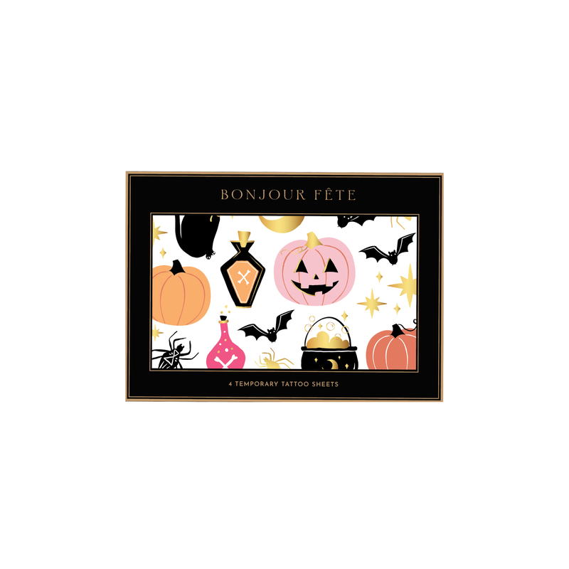 Four sheets of Halloween temporary tattoos with spooky icons in a flat lay on a white background.