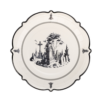 Decorative plate with a black and white illustration of a graveyard on a white background.