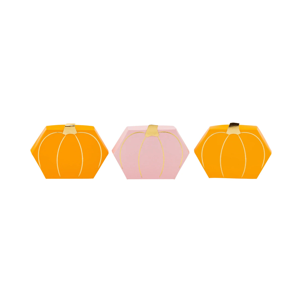 Isolated lineup of three pumpkin favor boxes—bright orange, pastel pink, bright orange—highlighting geometric shape and metallic gold foil accents on each stem.