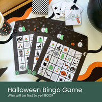 Moment & Co's Vintage Halloween Subscription Box - Halloween Bingo Game cards on a Halloween table.