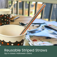 Moment & Co's Vintage Halloween Subscription Box - Reusable Striped Straw inside Halloween party cup.