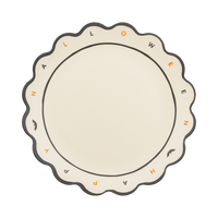 Happy Halloween bamboo serving tray, 15" round with scalloped edges and "HAPPY HALLOWEEN" in black and orange on cream, overhead view on white background.