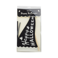 Close view of the front packaging of HAPPY HALLOWEEN with black and white ink lettering on black felt.